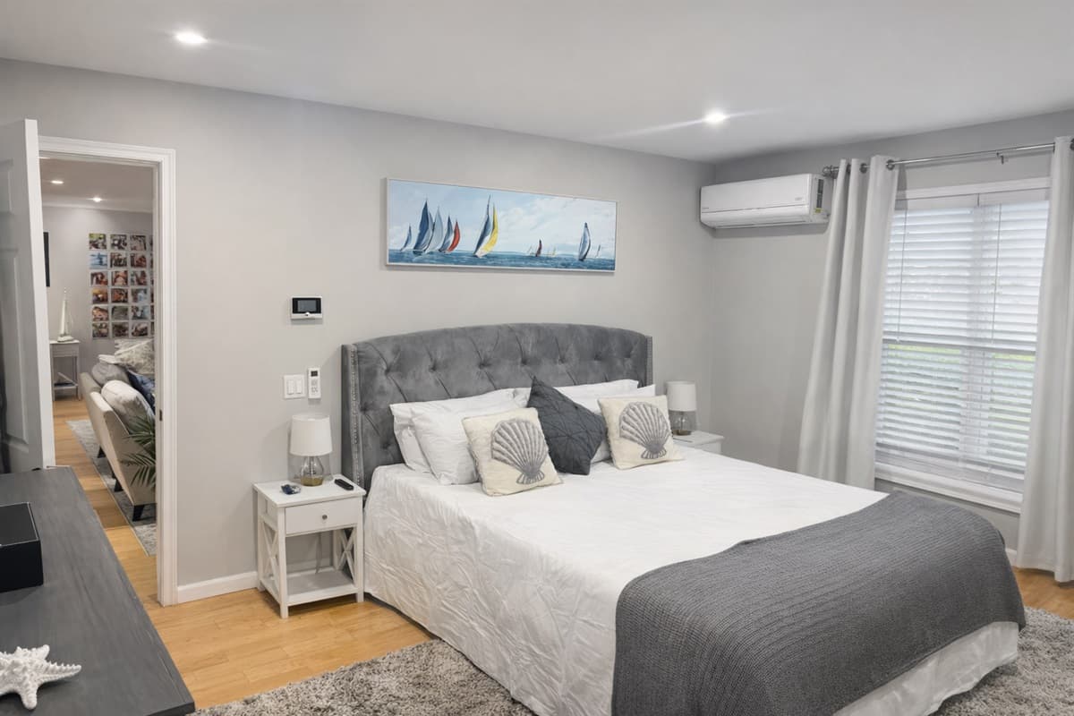 Master bedroom (first floor) with queen bed and ensuite bathroom