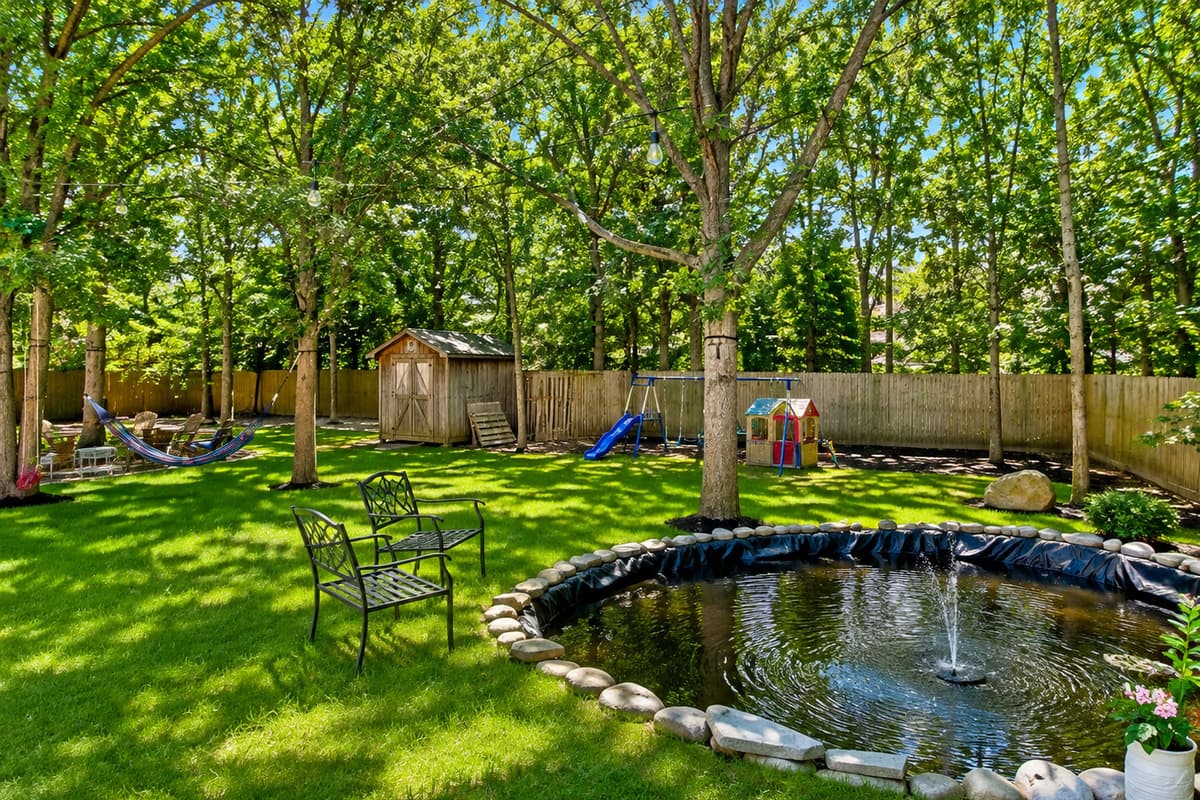 Tranquil backyard pond with fountain